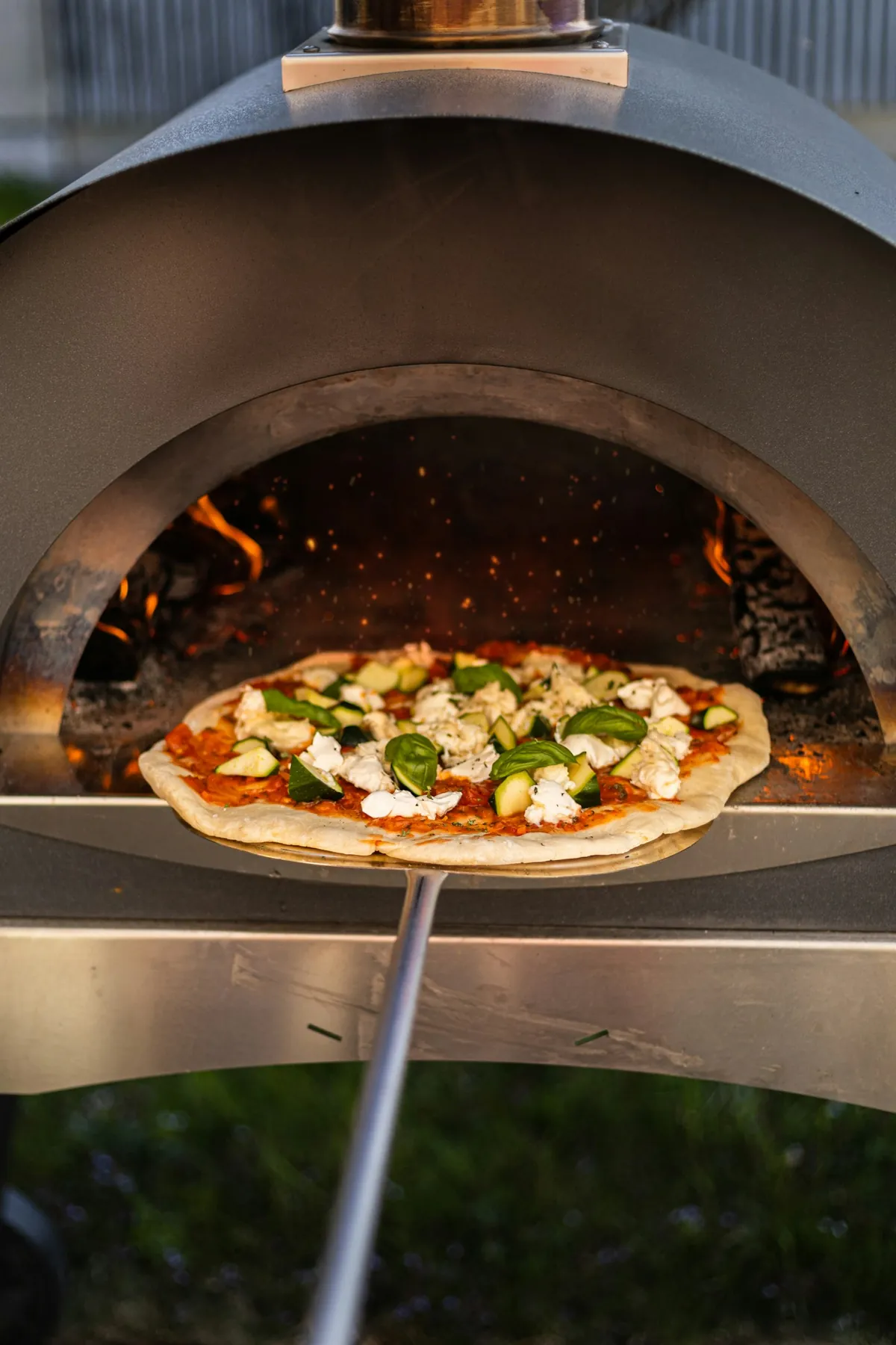 Freshly baked pizza with a blistered crust
